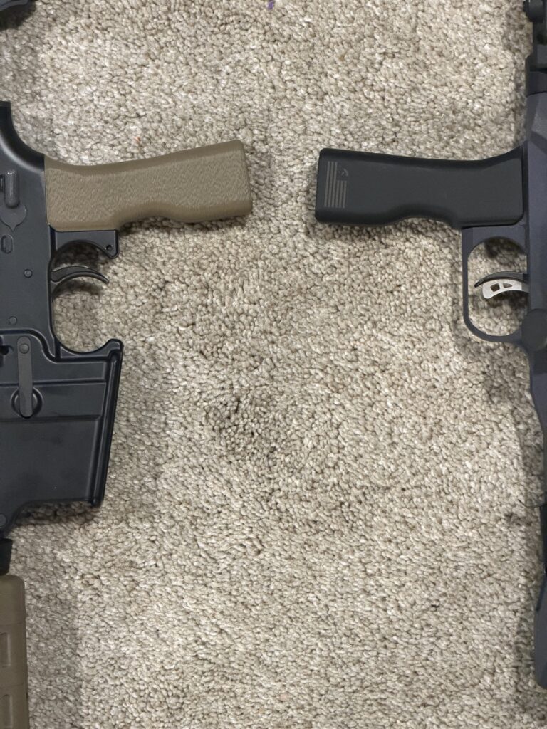 Black and FDE youth AR grips installed on rifles