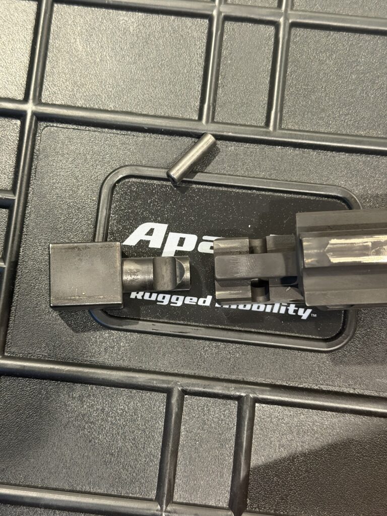 Stribog locking block removed from the bolt group, with its pin set aside
